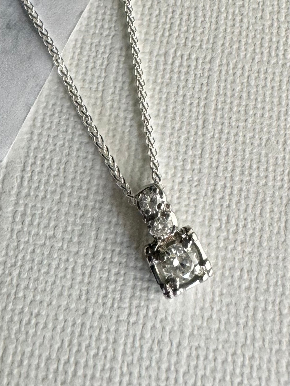 Create diamond pendant from customers 2 tone diamond engagement ring & supply 18" silver chain