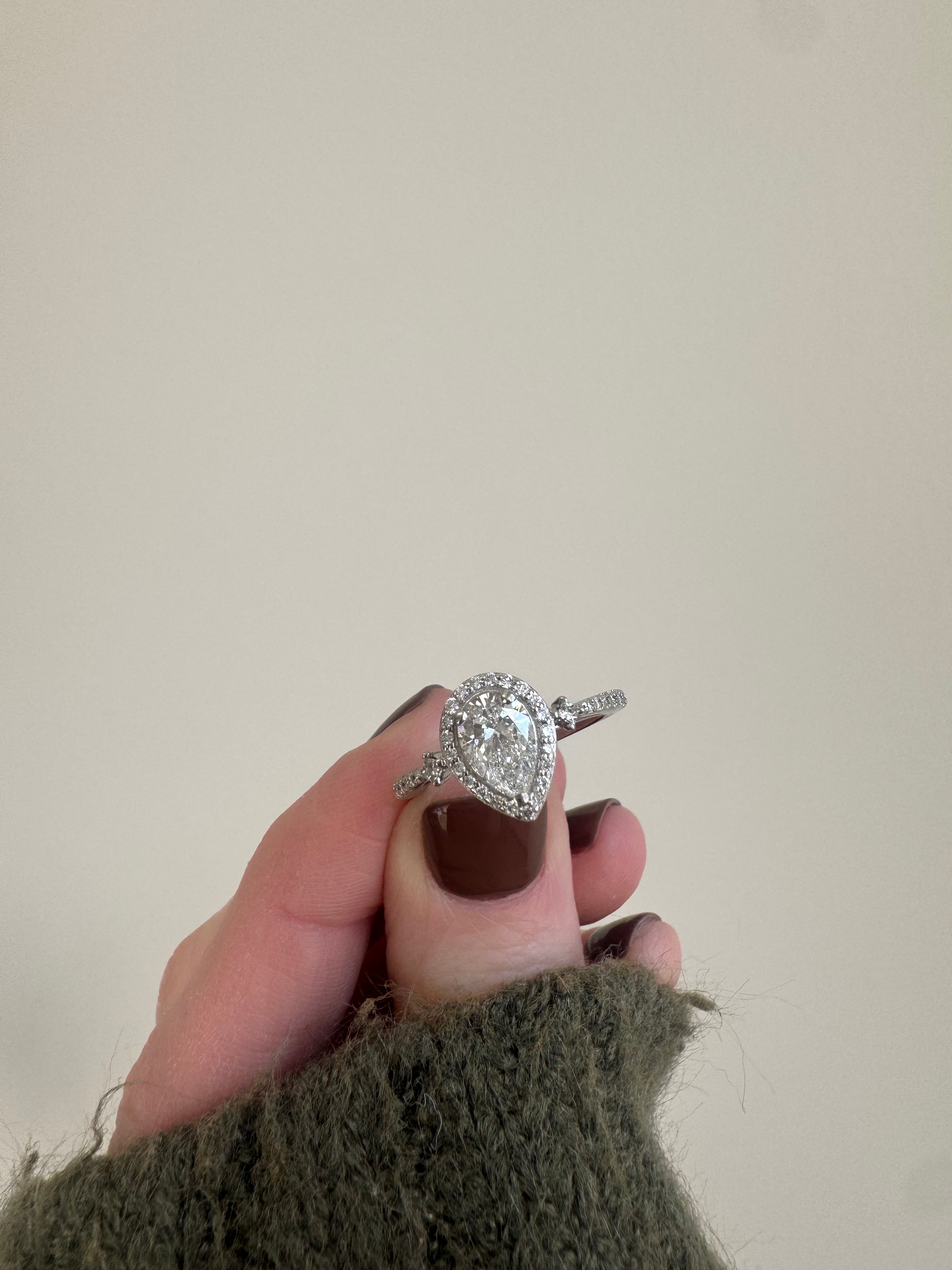 Repair eng. ring: set supplied princess cut & retip, retip other princess cut. Set supplied diamond in halo & retip. Retip 1 other missing prong in halo.