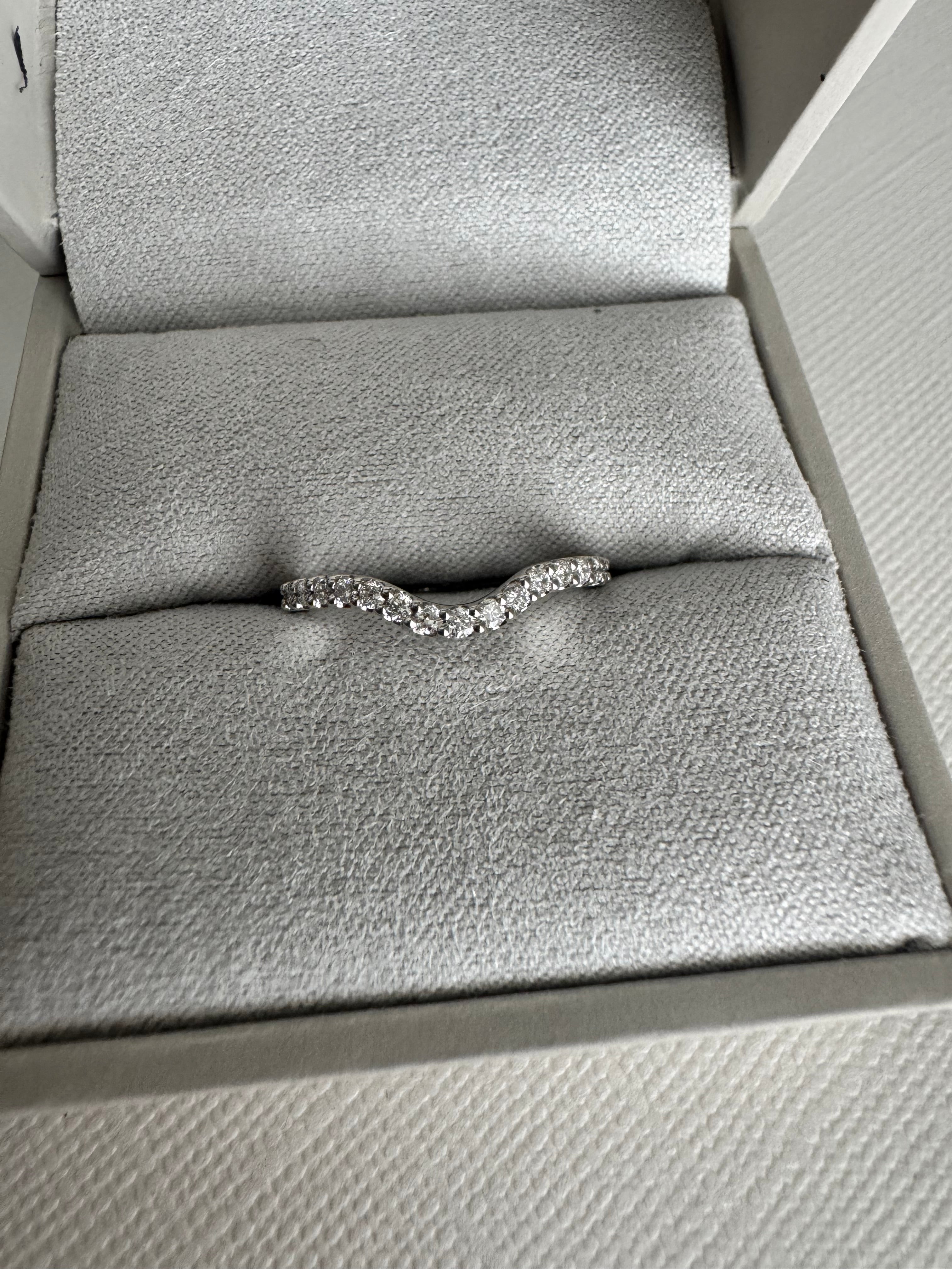 Custom 14k white gold lab grown diamond curved wedding band. Size 6.5. Carat weight approx. 0.23 carats.