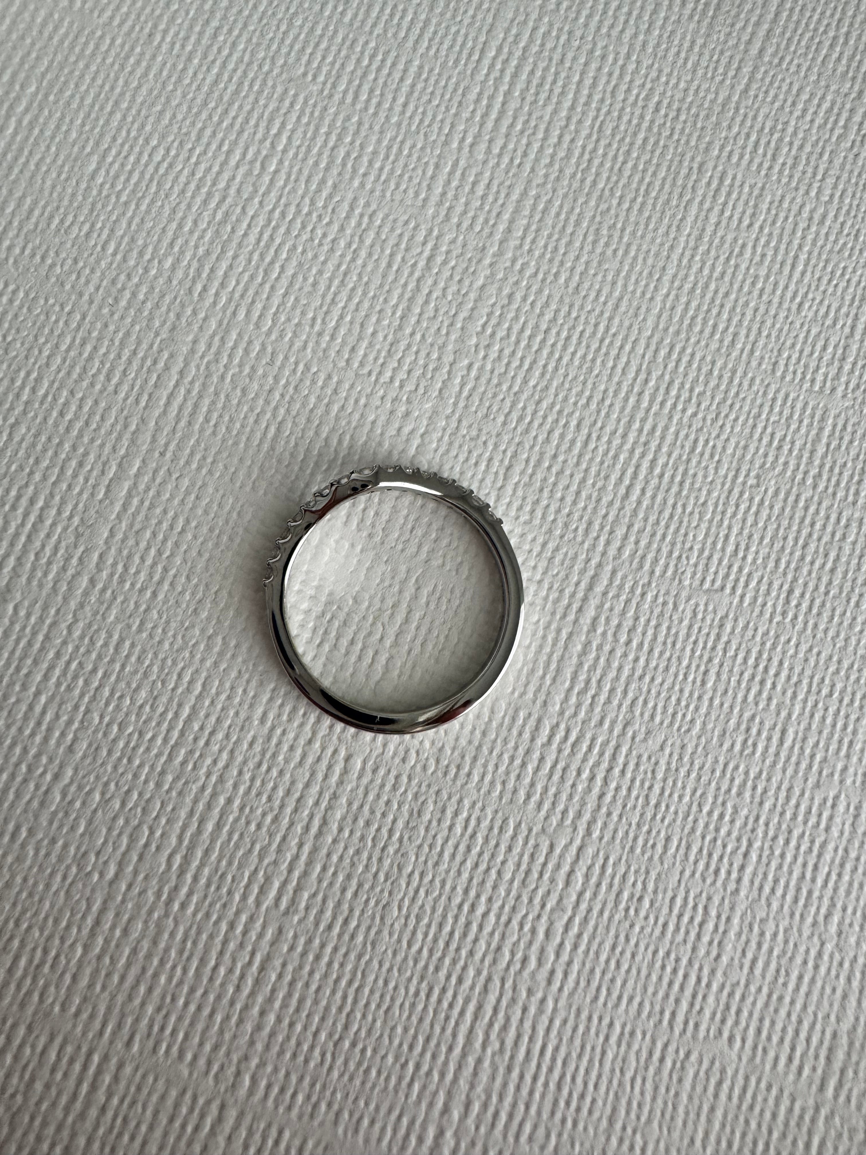 Custom 14k white gold lab grown diamond curved wedding band. Size 6.5. Carat weight approx. 0.23 carats.