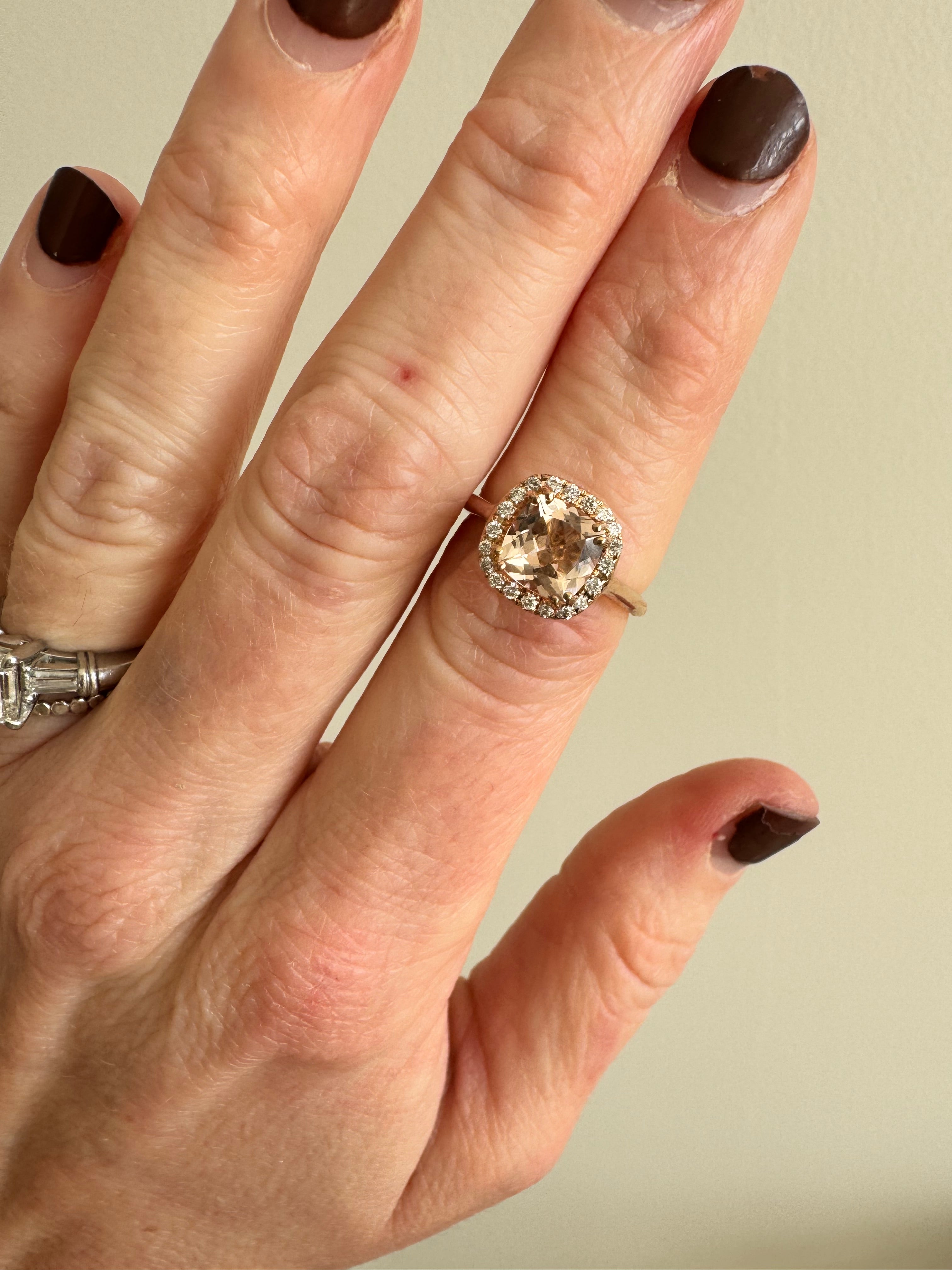 14k rose gold diamond & morganite engagement ring: Replace 7x7mm cushion morganite, retip morganite, supply 1mm round diamond and retip. Refinish.