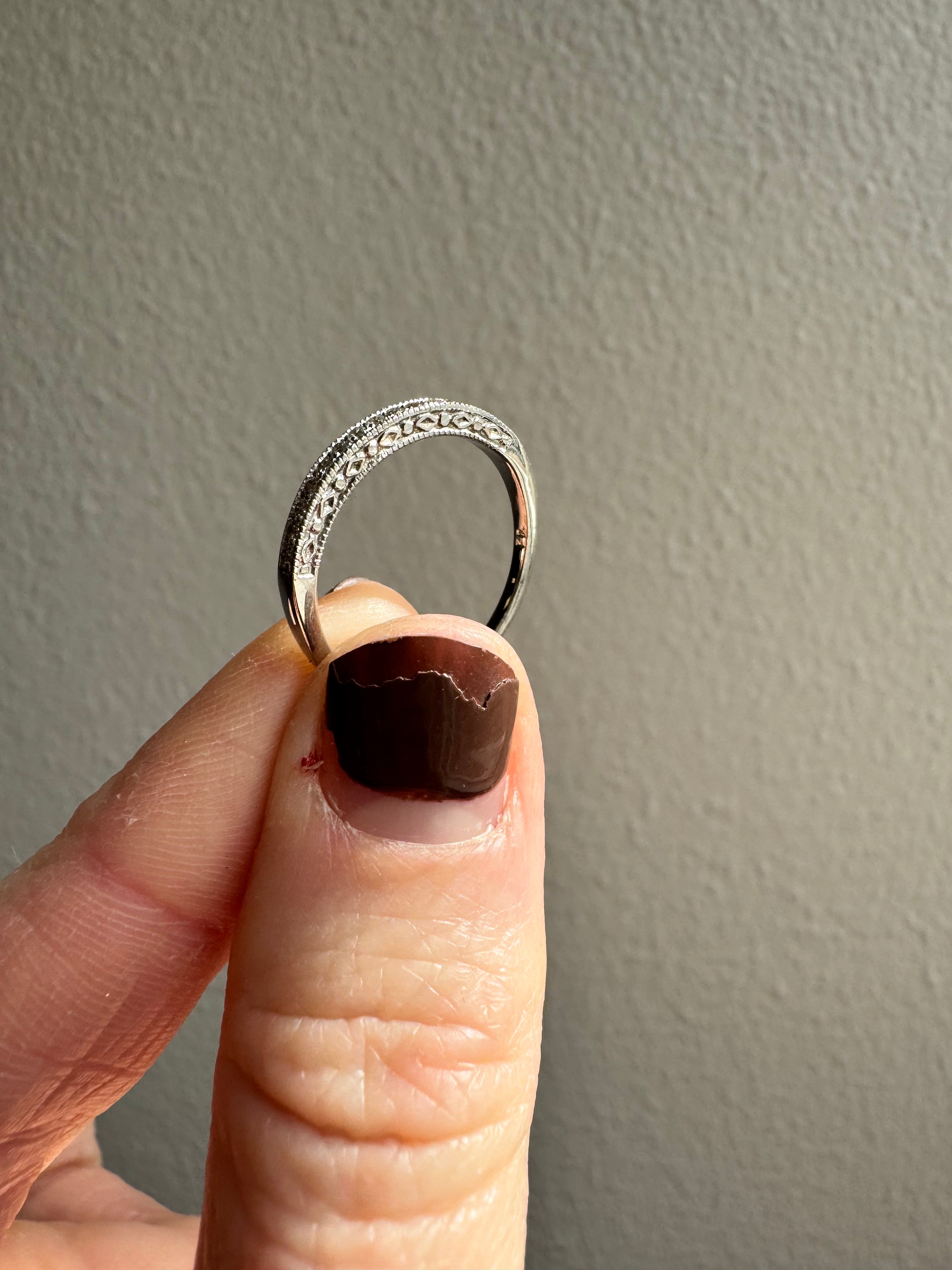 Repair: 14k white gold diamond wedding set. Remove engagement ring from soldered wedding band & refinish wedding band.