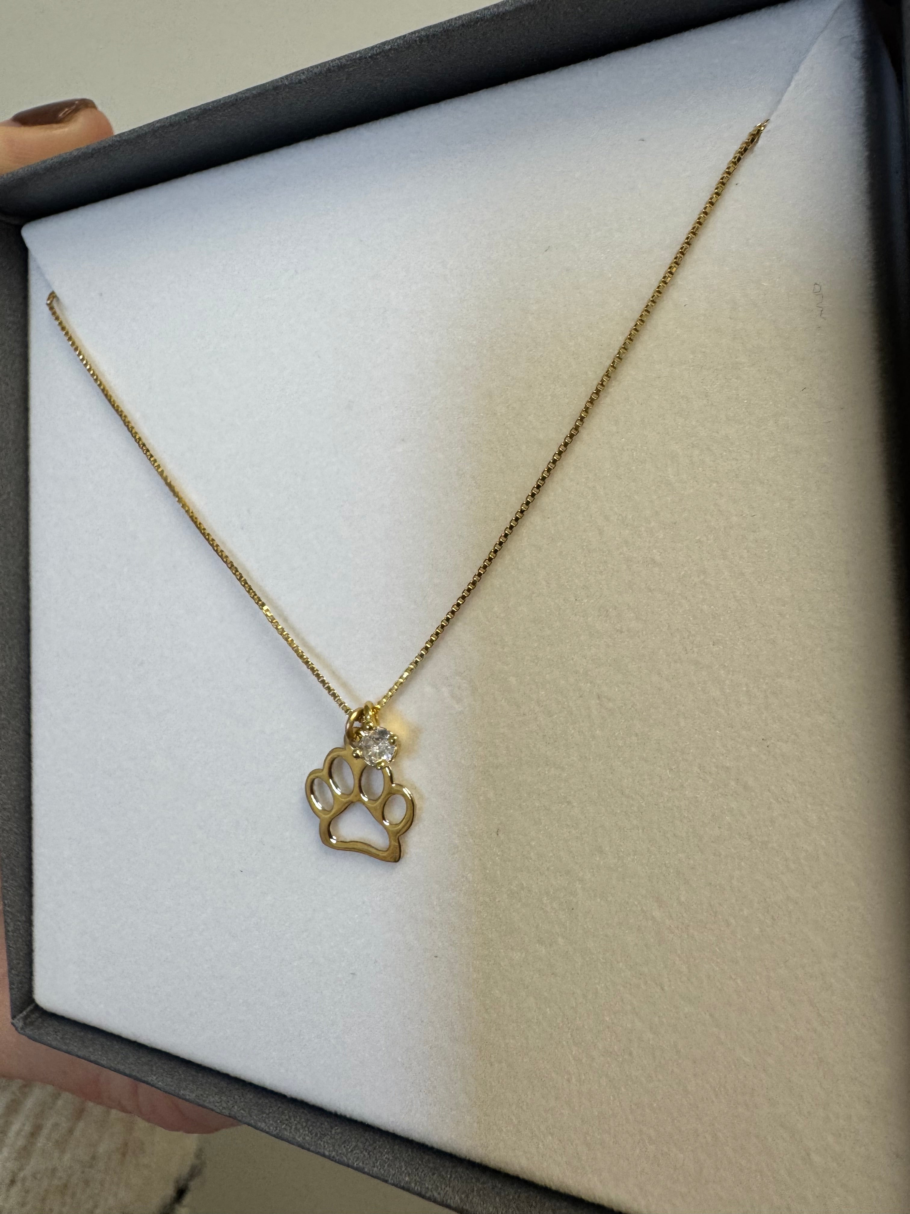 18k yellow gold filled box chain (16"+2" extender, .70mm) with 1, 3mm round CZ & 1, 14k yellow gold paw print charm.