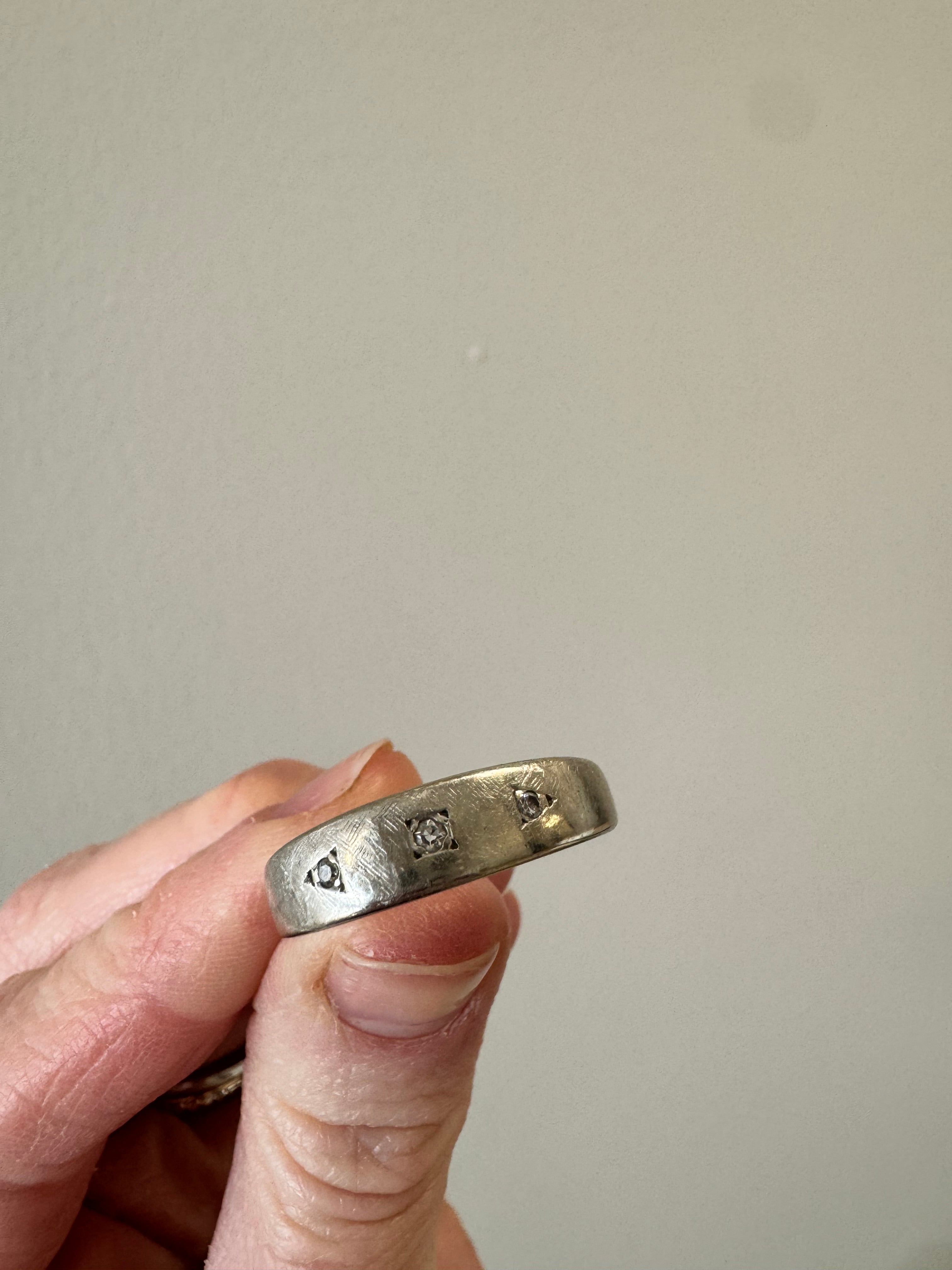 Turn white gold wedding band w/3 diamonds into pendant. Preserve engraving on back. Florentine finish on front to match original band. Supply 20", 1.6mm spiga chain in rhodiom-plated sterling silver.