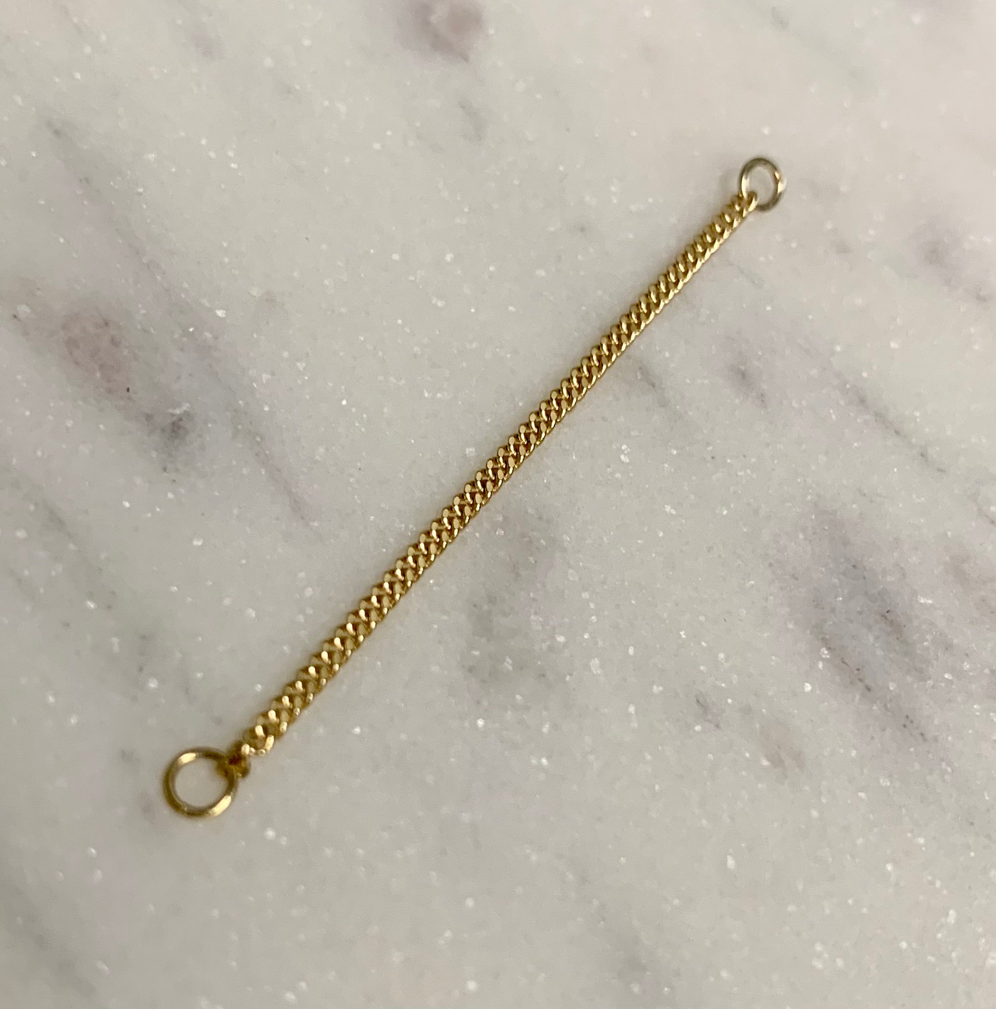 14k yellow gold curb nose ring chain