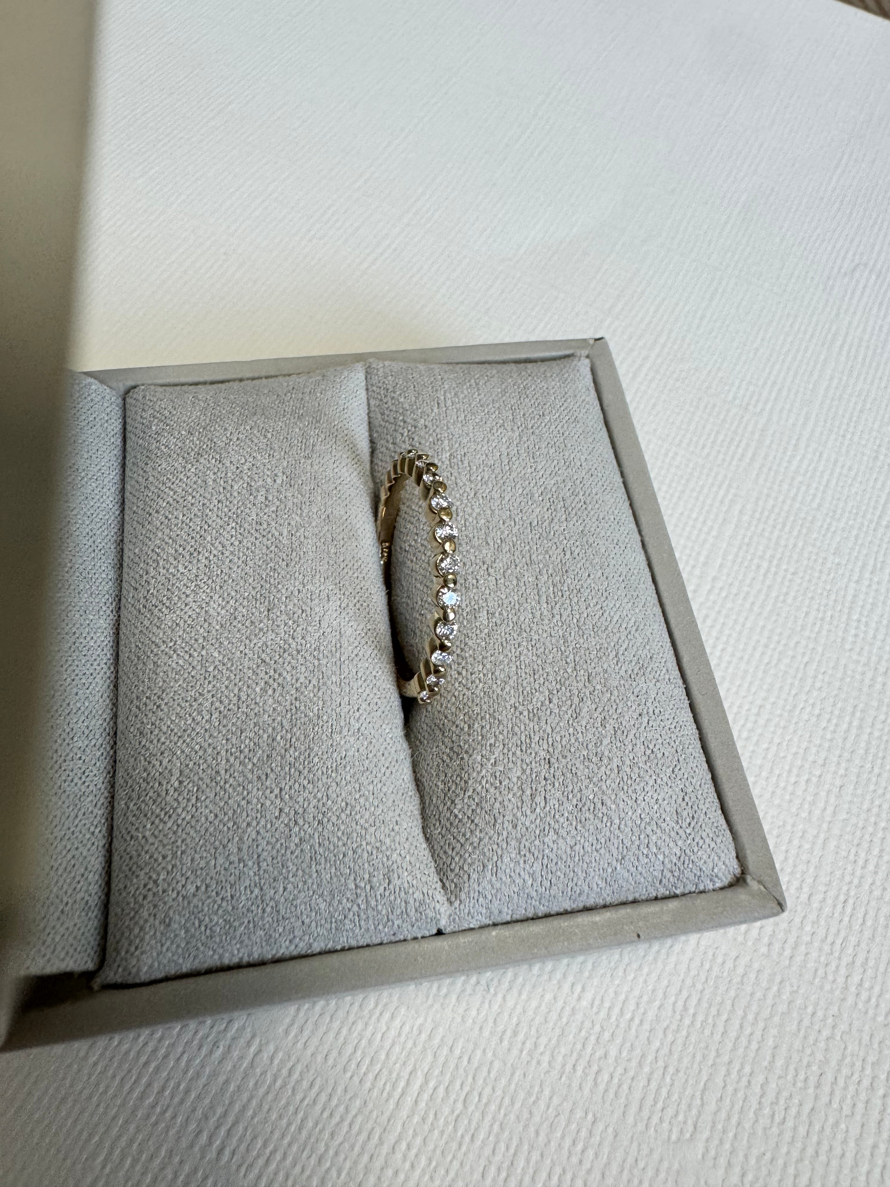 14k yellow gold round lab grown diamond wedding band. Size 5.75. 0.23 carats.
