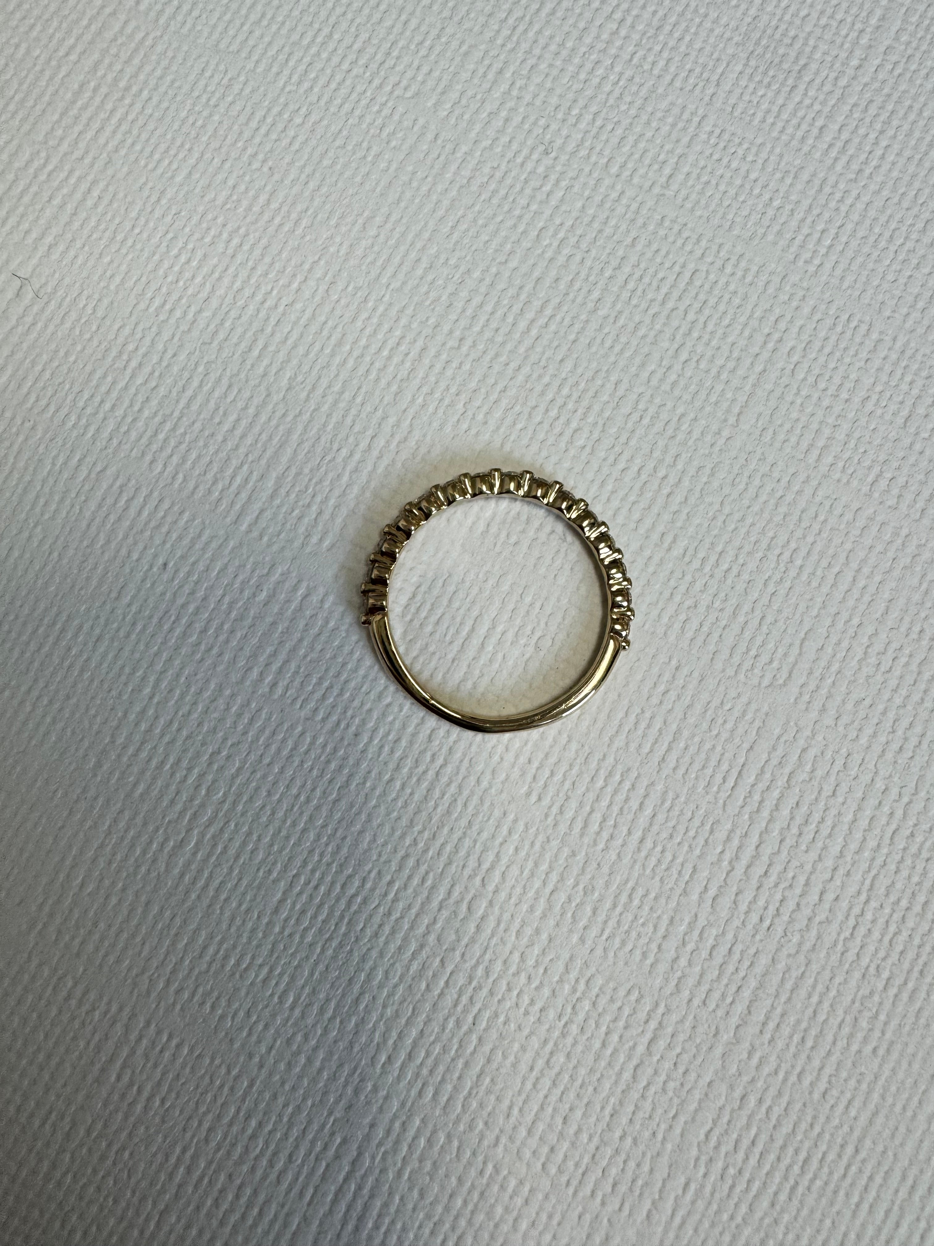 14k yellow gold round lab grown diamond wedding band. Size 5.75. 0.23 carats.