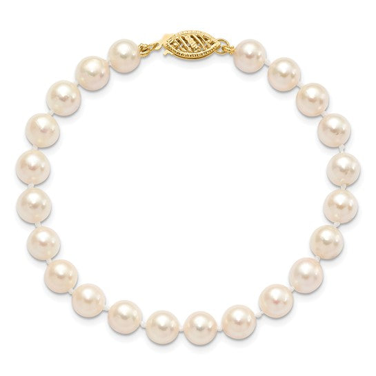 6-7mm White Round Akoya Saltwater Cultured Pearl Bracelet with a 14k yellow gold clasp. 7 inch.