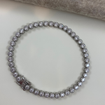 Sterling Silver Rhodium-plated Round CZ Tennis Bracelet with Milgrain Detail